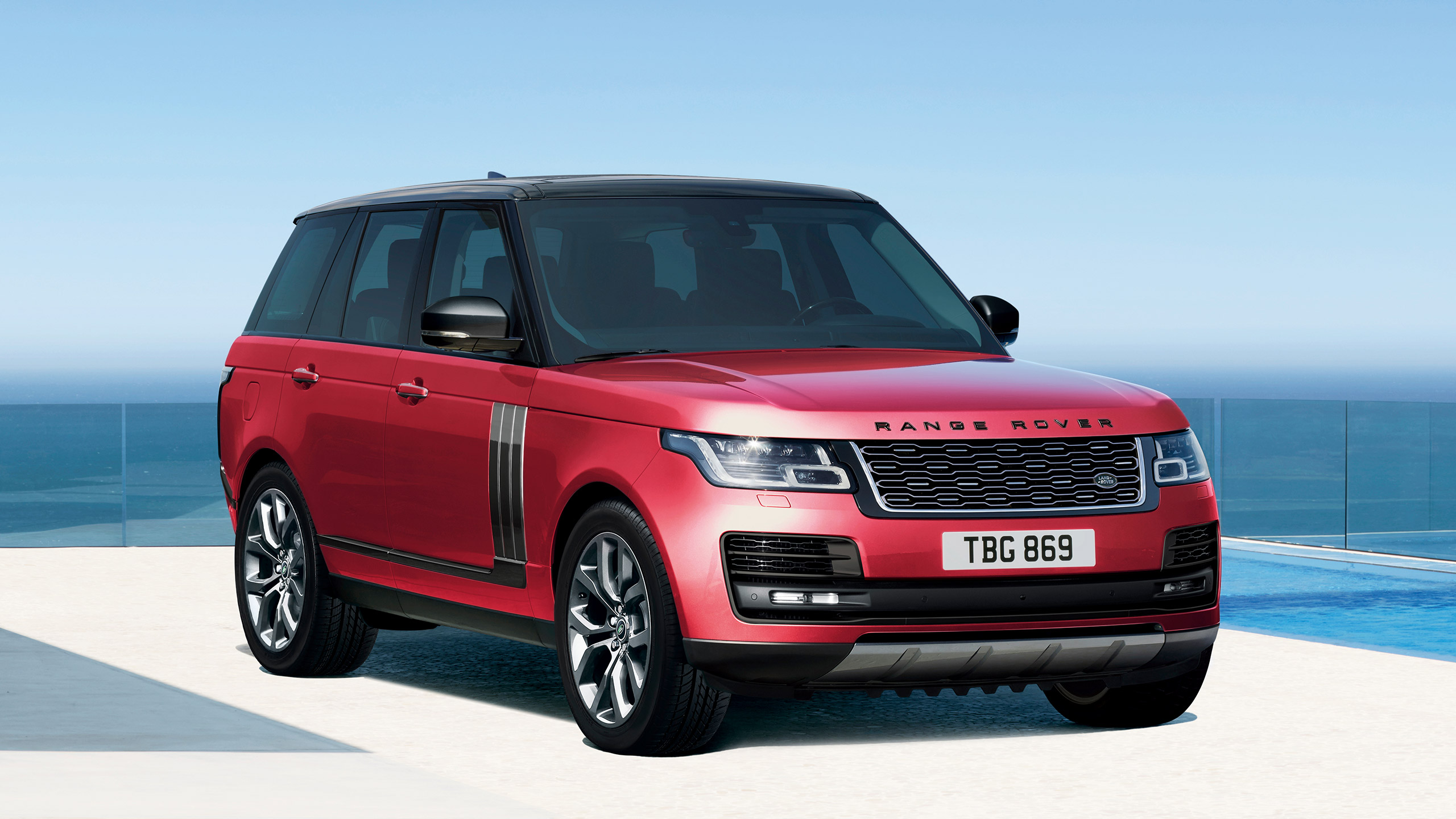 Parked Range Rover outside of glass area